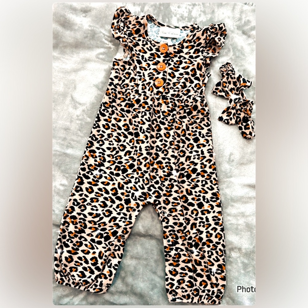 Leopard print jumper for infant.